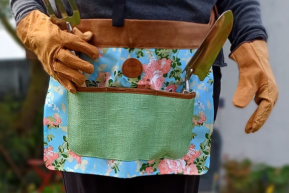 Tablier porte-outils de jardinage avec multiples poches et emplacements pour ranger les outils essentiels